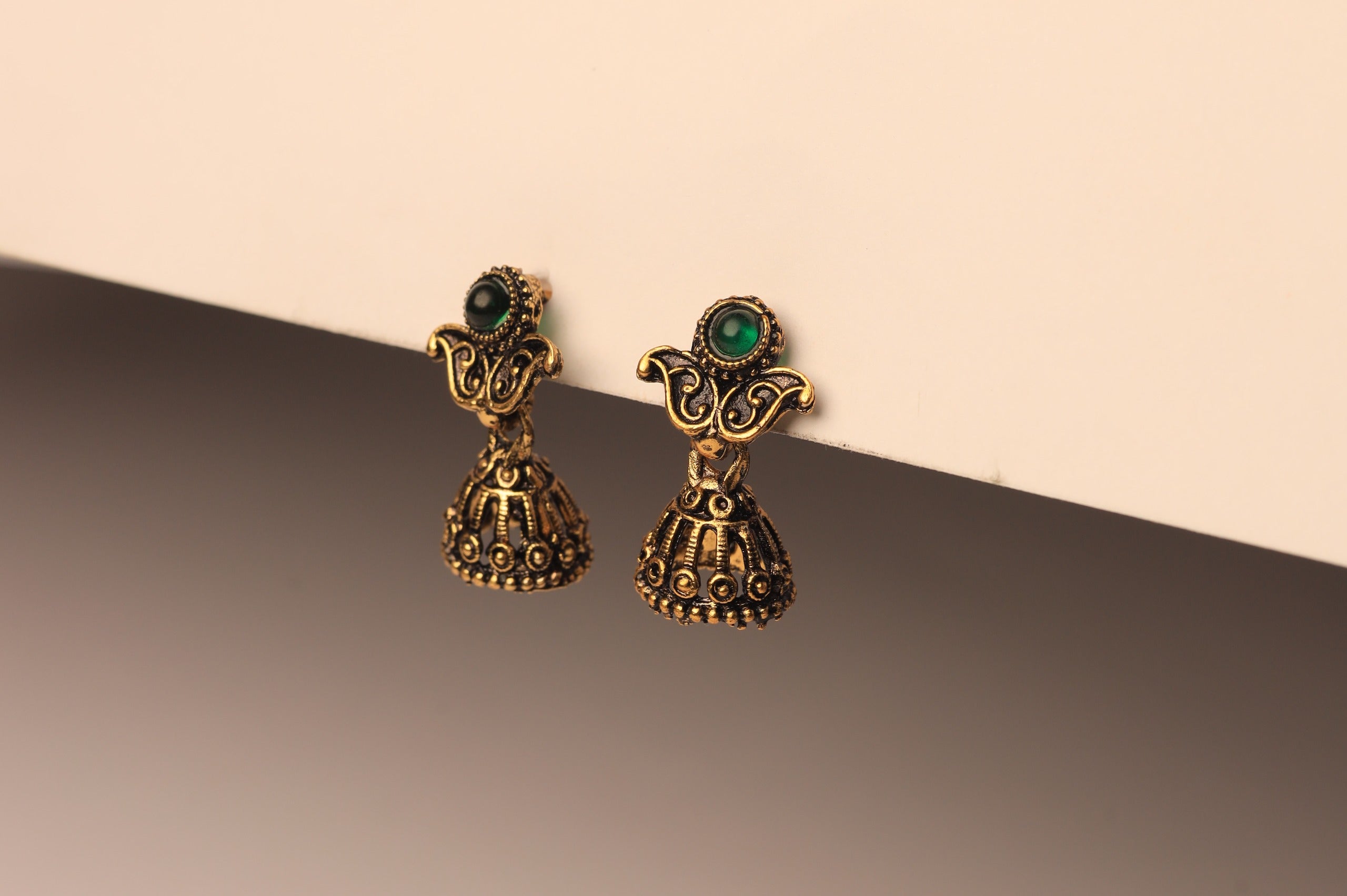 Royal Antique Jhumkas – Green Stone Charm
